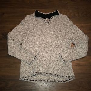 White and black sweater